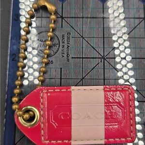 Coach Pink Tag with Gold Chain